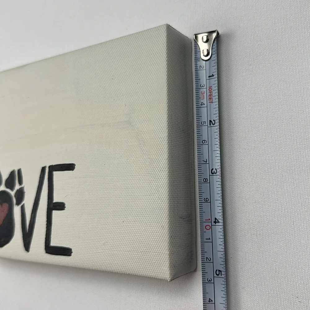 Hand crafted (painted) wall art decor. “Love” with a puppy paw and heart.